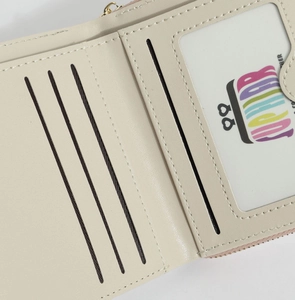 Detail view of cream PU leather wallet interior featuring four card slots and photo ID window