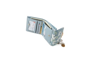 Internal view of a floral PU leather tri-fold wallet showing multiple card slots and cash pocket