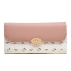 Détail d'un portefeuille long pour femmes avec imprimé pêche et fermoir fleur en métal