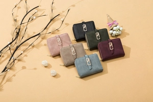 Women's short matte wallets in six colors with gold leaf charms and zip closures