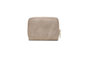 Detail view of the apricot PU leather wallet with vertical stitching and gold zipper closure