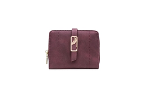 Detail of burgundy short wallet with leaf metal clasp and frosted texture finish