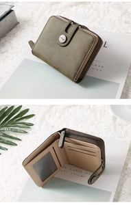 Detailed interior of olive green PU leather bifold wallet with card slots and clear ID window