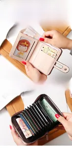 Detail of pink PU leather wallet showing 11 card slots and accordion zip pocket