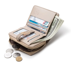 Beige faux leather bifold wallet with gold leaf buckle and multiple card slots