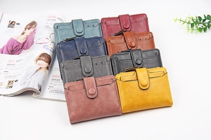 Detailed flat lay of minimalist PU leather short wallets in eight various vintage colors