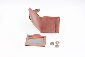 Short brown PU leather bifold wallet and matching card holder set with visible stitching