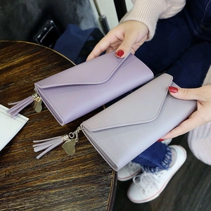 Elegant long envelope wallets for women with heart pendant and tassel decoration