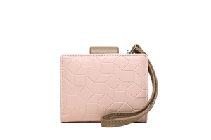 Detail of pink PU leather wallet with geometric texture and khaki wrist strap