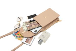 Detail view of large capacity crossbody phone bag showing cards and phone compartments