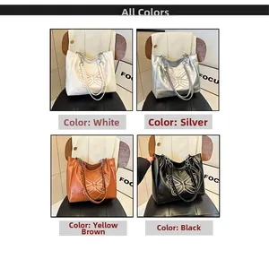 Detailed color selection for large tote bag with butterfly print and metal chain straps