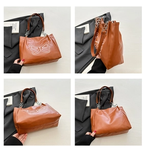 Detailed four-angle view of brown tote bag with white butterfly print and metal chain detail