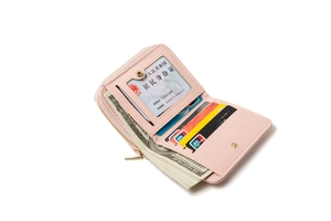 Pink bifold wallet interior showing card slots, ID window, and coin zipper pocket