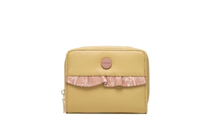 Detail of ginger leather wallet with pink ruffled trim and fine floral print design