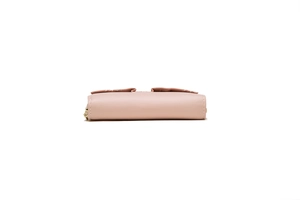Detailed bottom view of pink leather wallet showing premium stitching and gold zipper