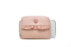 Compact pink leather coin purse size comparison with a smartphone on white background