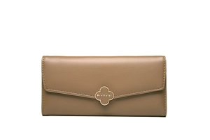 Detailed view of women long wallet with golden clover buckle and premium leather texture