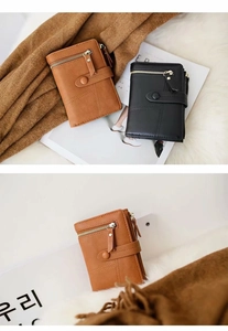 Detail of matte PU leather women's wallets with geometric stitching and snap closure
