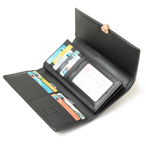 Detailed view of women's long black wallet showing multiple card slots and metal buckle