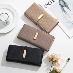Three elegant quilted long wallets for women with stylish gold metal buckle closures
