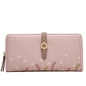 Detail view of pink long wallet featuring floral prints and golden metal buckle closure