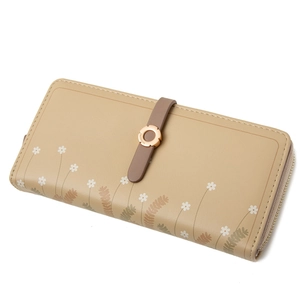 Detail of long floral wallet with daisy prints and gold magnetic metal buckle