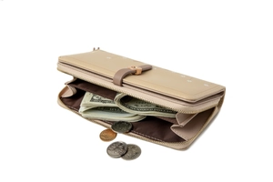 Interior detail of apricot long floral wallet showing multiple cash slots and beige PU texture