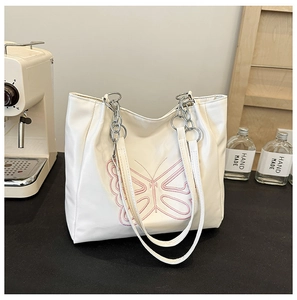 White PU leather tote bag with pink butterfly embroidery and metal chain strap for women