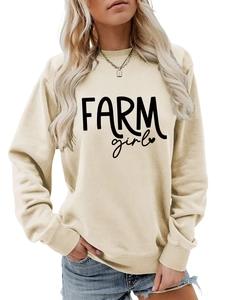 Detail of Farm Girl print on beige crewneck sweatshirt with ribbed cuffs and neckline