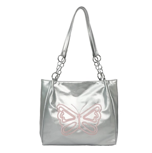 Silver metallic tote bag with pink butterfly design and chain strap for women