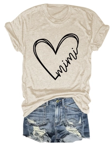 Flat lay of mimi heart print short sleeve T-shirt with distressed denim shorts