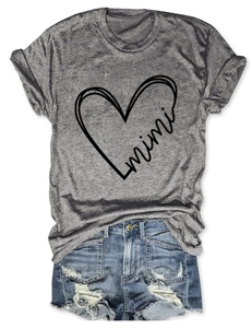 Detail of grey crewneck mimi heart print t-shirt paired with distressed denim shorts