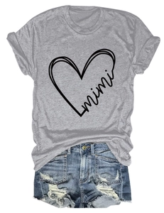 Close-up of grey T-shirt with heart mimi print and blue distressed denim shorts