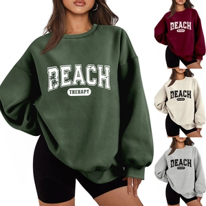 Detail view of Beach Therapy sweatshirts showing forest green, burgundy, cream and grey colors