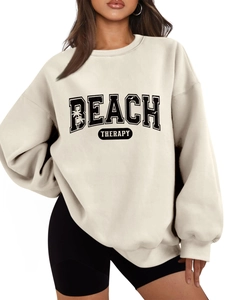 Detail of Beach Therapy oversized cream sweatshirt with palm tree letter print design