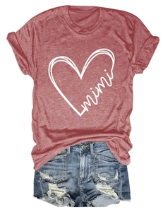 Flat lay of women's heart print T-shirt and ripped denim shorts with mimi text