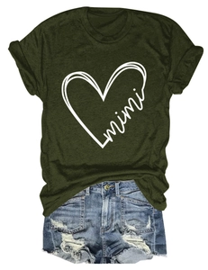 Flat lay of a dark green t-shirt with mimi heart graphic and ripped denim shorts