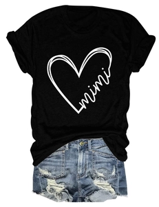 Detail of mimi heart print on black crew neck T-shirt with denim shorts set