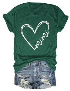 Flat lay detail of dark green T-shirt with mimi heart print and distressed denim shorts