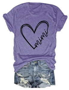 Detail of mimi heart print on purple crew neck t-shirt with denim shorts outfit