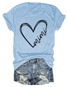 Detailed flat lay of light blue mimi heart print T-shirt and ripped denim shorts set