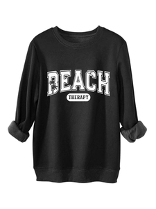 Detail of the soft fleece lining inside the cuff of this black Beach Therapy sweatshirt