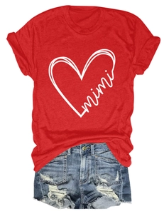 Detail of red crew neck T-shirt with white mimi heart print and distressed denim shorts
