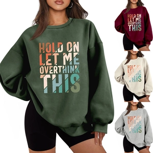 Thick crewneck sweatshirts in forest green, burgundy, cream and grey with slogan print