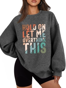 Detail of Hold On Let Me Overthink This print on a charcoal grey oversized sweatshirt