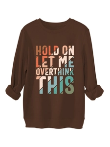 Detail of colorful retro Hold On Let Me Overthink This print on brown sweatshirt