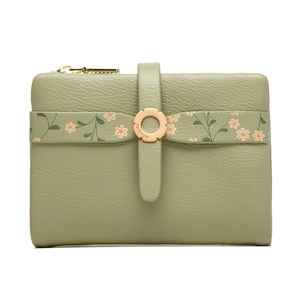 Short faux leather bifold wallet in sage green with daisy strap and gold buckle