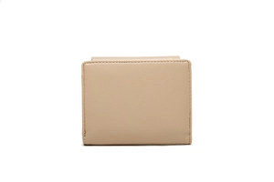 Close-up of minimalist beige leather wallet showing refined lychee grain and stitching