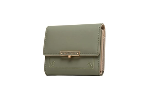 Detail of green tri-fold PU leather wallet with delicate leaf embroidery and metal hardware
