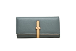 Macro view of grey faux leather wallet showing oval metal buckle and fine stitching